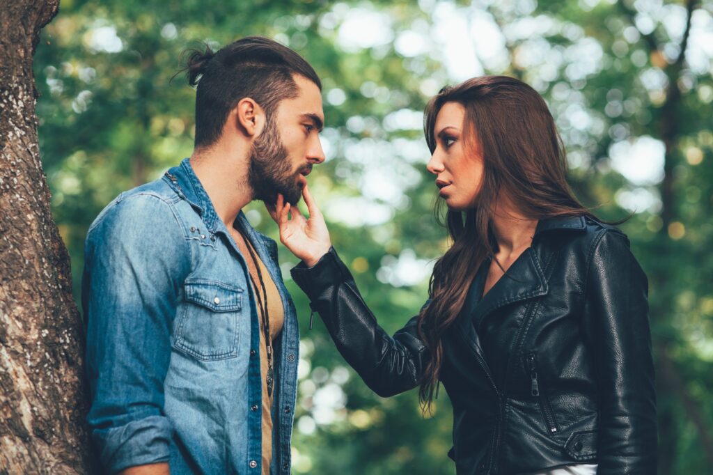 Young couple flirting in the park