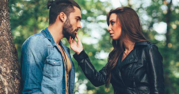 Young couple flirting in the park